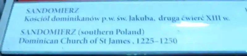 A cross on a stone with solar disc